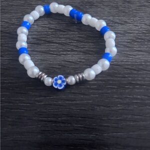 Blue and White Beaded Bracelet with Flower Charm